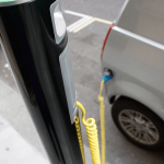 Car plugged into charging station